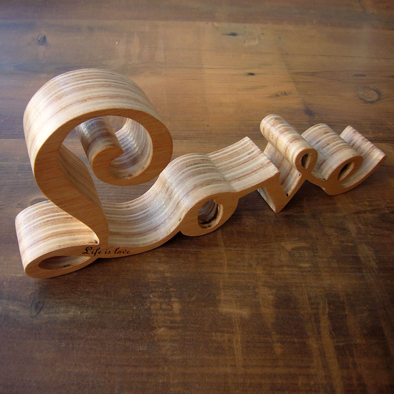 love artesano de madera con frase