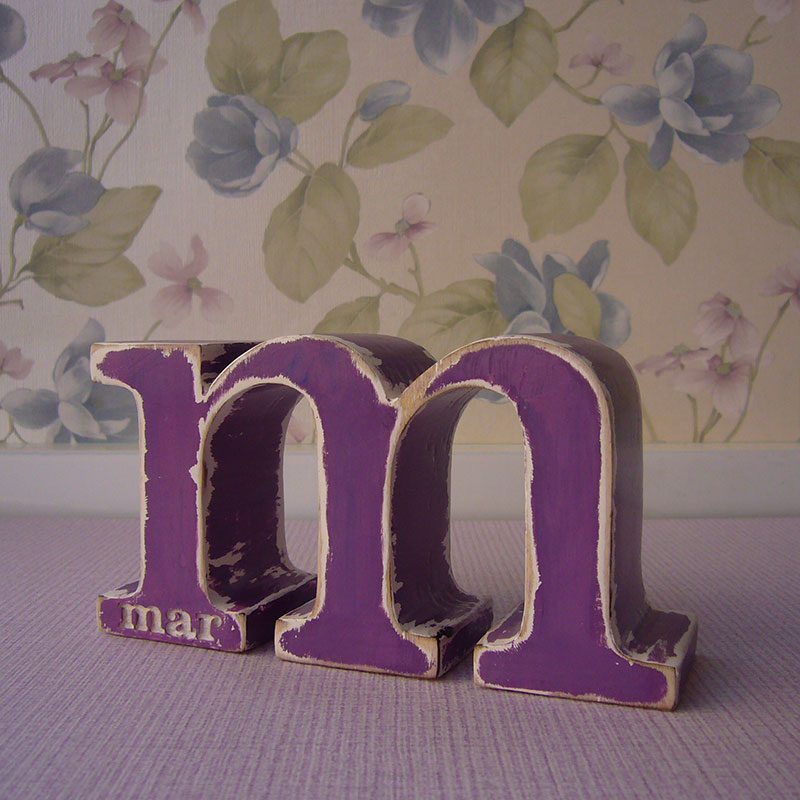 mar grabada en m malva de madera