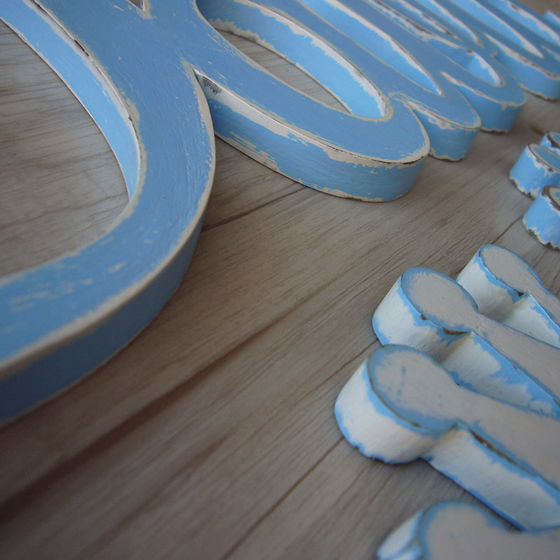 nombre de madera david en celeste